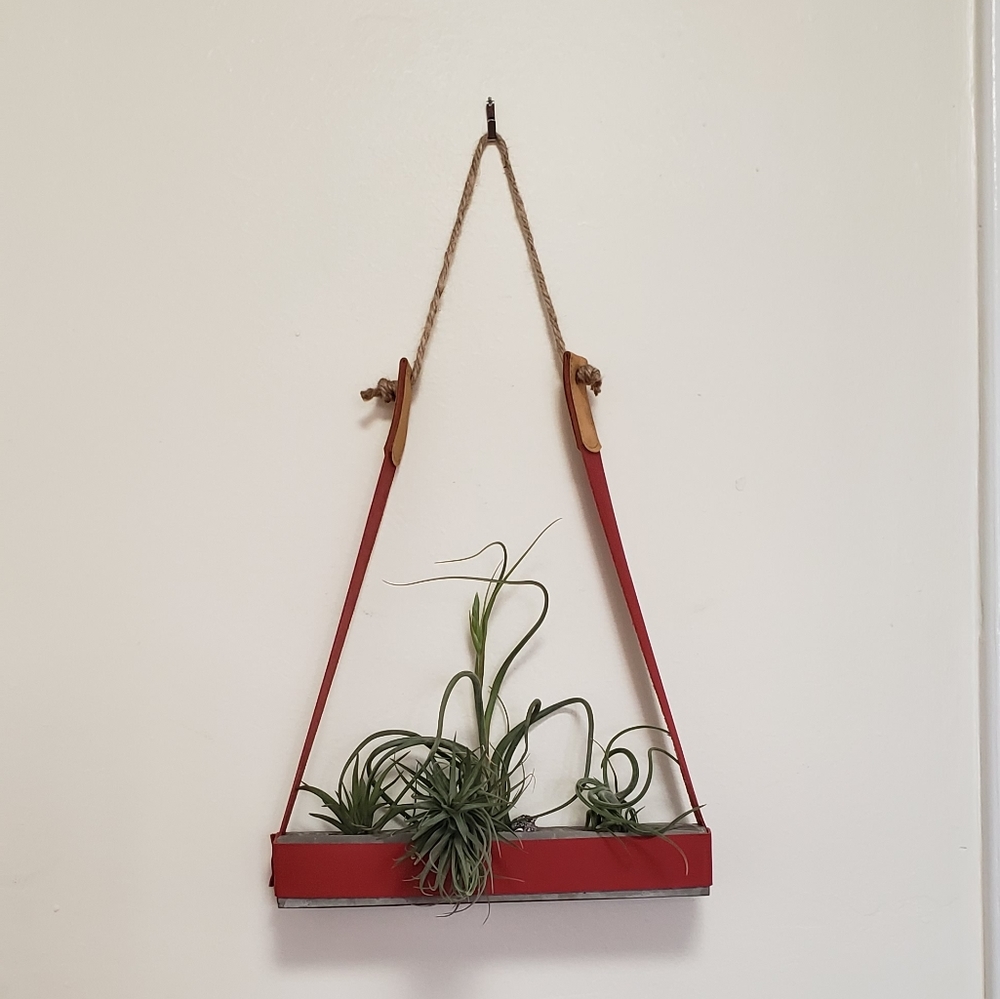Hanging leather and concrete airplane hanger